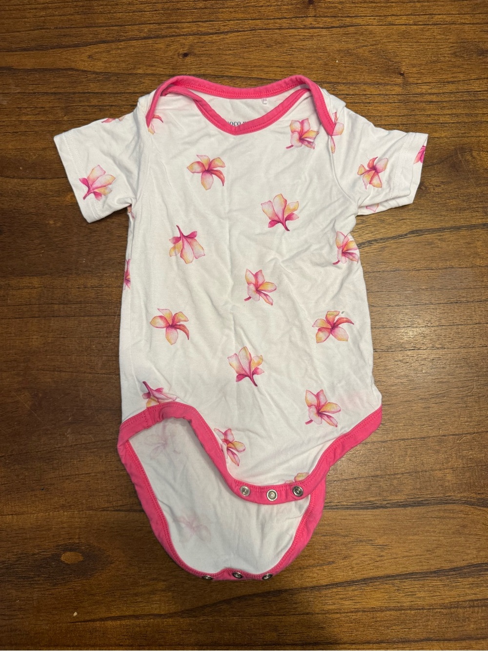 Coco Moon Baby Onesie with Pink Plumeria Print (6-12mo)